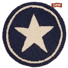 a white and blue star is on the side of a circular patch that says,