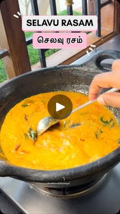 a person stirring a bowl of food on top of a stove with the words selavu rasam written in thai