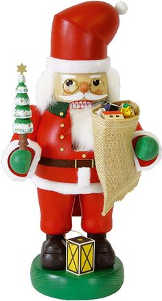 a santa clause figurine holding a sack of gifts