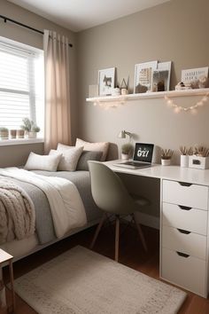 a bed room with a neatly made bed and a desk in front of a window