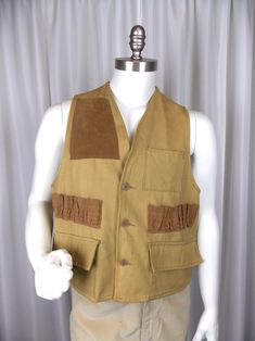 "Vintage men's hunting vest. Made of 100% cotton canvas with large rubberized pouch at the back. Button closure. Good vintage condition with minor wear. Label: Nesco Hunting Apparel, made in Japan 100% cotton Size: L Length 21\" Chest 44\"" Rubber Bags, Hunting Apparel, Red Leather Boots, Costume Making, Vintage Hunting, Hunting Vest, How To Make Skirt, Archery Hunting, Vintage Cottagecore