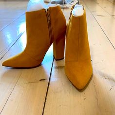 Never Worn Tan/Camel Booties! Size 6. No Scuffs. Still Stuffed With Original Wrapping. Pointed Toe. Thick Heel. Zipper Insides. Chic Yellow Heels For Fall, Casual Yellow Heels For Fall, Heeled Lace Up Boots, Colored Boots, Ankle Sneakers, Red Booties, Black Platform Boots, Black Suede Booties, Brown Heels