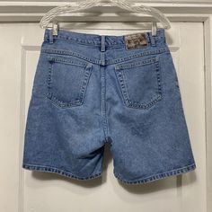 Vintage 90s/Y2k St Johns Bay Relaxed Fit Denim Shorts Tag says size 10.  Made in Nicaragua.  100% cotton.  In good shape no rips or stains that I can find.  The waist measures 16'' flat across and the length from waist to bottom along the side is 18''.  The inseam is 7'' and the rise is 12''. Y2k Style Cutoff Cotton Jeans, Y2k Cotton Cutoff Jeans, Y2k Cotton Jean Shorts With Pockets, Y2k Style Cotton Cutoff Jeans, Y2k High Rise Cotton Shorts, Y2k Mid-rise Cotton Shorts, Y2k Style Mid-rise Cotton Shorts, 90s Style Cotton Jean Shorts With Pockets, 90s High-waist Cotton Jean Shorts