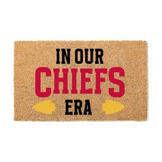 a door mat with the words in our chiefs era on it