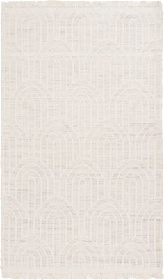 a white rug with wavy lines on it