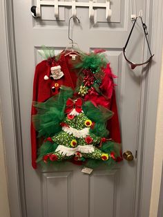 a christmas tree decoration hanging on the front door