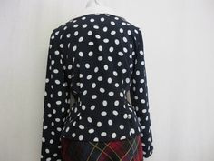 "Liz Claiborne Peplum Blouse ~Sassy~ Polka Dot Blouse ~This is a WOW~ Beautifully tailored and fitted Poly crepe A bit dress up! Button front Peplum waist Shoulder pads have been removed Small 4 Petite Bust 38\" Waist 30\" Hip 40\" Shoulder 16\" Length 19\" Excellent condition Looks unworn! https://www.etsy.com/shop/BelindasStyleShop" Fitted Long Sleeve Polka Dot Blouse, Classic Fitted Polka Dot Blouse, Classic Fitted Polka Dot Tops, Fitted Retro Workwear Blouse, Vintage Tailored Polka Dot Blouse, Fitted Vintage Polka Dot Blouse, Retro Fitted Polka Dot Blouse, Fitted Polka Dot Blouse For Work, Elegant Fitted Polka Dot Top