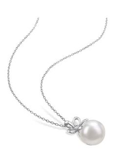 Draw immediate attention to your neckline with this magnificent White Freshwater Cultured Pearl and Created White Sapphire Bow Pendant with Chain. Crafted in luminous sterling silver, this pendant features one button shaped glowing white freshwater cultured pearl (12 - 12.5mm) and one round-cut shimmering created white sapphire gemstone that are cultured on the unique bow pattern using bezel setting. Enhanced with a high polish finish, this pendant is suspended on 18-inch round cable chain. Deck Elegant Silver Chain Jewelry For Formal Occasions, Elegant Formal Silver Chain Jewelry, Elegant Necklace With Sterling Silver Clasp And Round Pendant, Elegant Necklace With Sterling Silver Round Pendant, Elegant Silver Chain Jewelry, Elegant Silver Chain Necklace For Formal Occasions, Elegant Silver Chain Evening Jewelry, Elegant Silver Chain Jewelry For Evening, Elegant Sterling Silver Clasp Jewelry With Round Pendant