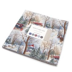 a christmas themed placemat with trees and farm animals on it, in front of a white background