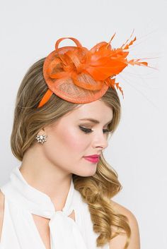 "\"Arianna\" Orange Fascinator This season, sophisticated fascinators stole the show on the runways. Fascinators can be a little intimidating. But this cute little fascinator will help you overcome that fear. It perfectly lands the look, thanks to its mesh sinamay, frilly feathers and loopy mesh ribbons. No matter the occasion, you will fit in with the fascinator craze with this simple yet stylish head-piece. Add Men's Matching Bow Tie: Don't you dare get caught mismatching your sweetie's favori Chic Spring Formal Hair Accessories, Chic Formal Spring Hair Accessories, Spring Fascinator For Costume Party, Elegant Fall Party Fascinator, Elegant Mini Hats For Kentucky Derby Costume Party, Chic Hair Accessories For Spring Party, Elegant Fascinator For Costume Party At Royal Ascot, Elegant Fascinator For Royal Ascot Costume Party, Spring Formal Headpiece With Feathers