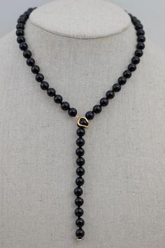 Material               : Black Onyx  Gemstone Beads with 925 Silver / Gold clasp Quantity              :  One Necklace  Length                 :  20 inch approx. Color                     : Black Onyx as pictured Bead Shape         : Round Smooth as pictured Bead Size             : 8mm approx. Lead Time & Shipping :  We ship your order in 3-5 business days (Mon - Fri). If we offer FREE DOMESTIC shipping, package will be shipped via USPS First Class mail on orders shipping within the U.S. W H O L E S A L E    I N Q U I R Y :- Please convo us at anytime if you need to purchase in Wholesale Quantity and Custom Made Orders.  We will be very happy to assist you at our earliest convenience. Luxury Onyx Beaded Necklaces With Gemstones, Cheap Black Jewelry With Gemstone Beads, Cheap Black Beaded Necklaces For Jewelry Making, Luxury Black Necklace With 8mm Beads, Cheap Black Pendant Beaded Necklace, Cheap Adjustable Black Beaded Necklaces, Luxury Long Black Beaded Necklace, Luxury Onyx Beaded Necklaces With Gemstone Beads, Affordable Black Beaded Metal Jewelry