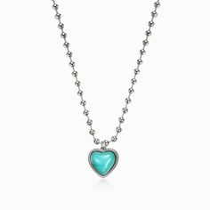 This Tiffany-blue heart necklace provides a pop of color and stands out in it's own right. Wear it on it's own or pair this look with the Angelic Necklace. Material: Platinum-plated Copper, Turquoise Weight:14.8g Size: 16.5 inches Angelic Necklace, Aquamarine Necklace, Mermaid Necklace, Copper Turquoise, Pearl Chain, Blue Heart, Tiffany Blue, Effortless Chic, Wear It