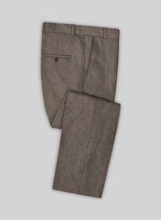 Gain the edge with our Solbiati Linen Anael Pants, a couture that harmonizes with your charismatic personality and offers timeless luxury. Crafted from pure linen fabric, these pairs grant a gentle and silky profile with a solid finish on a brown hue that lends excellent comfort when worn. Summit up the confidence with our elegantly tailored brown pants suitable for relaxed instants and formal interactions.   Look Includes  Solbiati Linen Anael Fabric  Cross Pocket  Flat Front  Two Welted Back Pockets on Trousers   You can change the look during customization if required.   Lining: Viscose, Dry Clean, Pants can be lightly washed. Brown Single Breasted Tailored Suit, Elegant Brown Single-breasted Suit, Tailored Brown Suit With Double Button Closure, Brown Tailored Double-breasted Suit, Brown Tailored Single-breasted Suit, Charismatic Personality, Grey Tweed Suit, Green Velvet Jacket, Herringbone Tweed Jacket