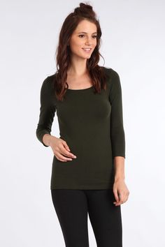 This item is final sale & cannot be accepted for return. This 3/4 Sleeve Top features a Scoop Neck and just the right amount of stretch. Our seamless fabric hugs your body without riding up and is great alone or layered. Fitted Seamless Long Sleeve Top, Spring Seamless Stretch Long Sleeve Top, Stretch Long Sleeve Scoop Neck Top In Solid Color, Solid Stretch Long Sleeve Top With Scoop Neck, Solid Color Stretch Long Sleeve Top With Scoop Neck, Fitted Long Sleeve Top With Scoop Neck, Fitted Long Sleeve Scoop Neck Top, Green Stretch Top With 3/4 Sleeves, Green Fitted Top With 3/4 Sleeves