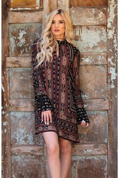 This dress has a really nice bohemian print. It features a choker neckline with front & back keyholes, double tie sleeves, a removable tie at the waist and an a-line mini silhouette. Small Bust 40" Length 33" : Med Bust 42" Len 332" : Large Bust 44" Len 32" light weight rayon Black Boho Dress With Boho Print, Black Bohemian Dress With Boho Print, Black Boho Print Dress For Festival, Bohemian Fitted Mini Dress With Bell Sleeves, Fall Boho Hippie Dress With Boho Print, Bohemian Mini Dress With Boho Print, Bohemian Bell Sleeve Dresses For Fall, Bohemian Black Mini Dress With Floral Print, Black Bohemian Mini Dress With Floral Print