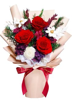 a bouquet of red roses and white flowers