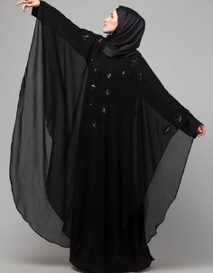 Beautiful Black Color embroidery Abaya easy to wear Back close with loop, button & zip, easy to wear embroidery On Chest Hijab and band shown in the image can be bought separately Fabric: PartyCare: Mild machine wash/ hand Cold Wash/Dry cleanWe request customers to carefully choose the correct size and dress length referring to our size chart Long Black Abaya For Eid, Black Long Khimar For Eid, Black Long Sleeve Khimar With Dabka, Long Sleeve Black Khimar For Eid, Black Long Sleeve Khimar For Eid, Black Khimar For Eid, Black Long Sleeve Hijab For Eid, Traditional Black Dabka Khimar, Black Long Thobe With Dabka