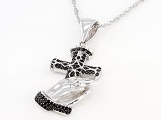 0.76ctw Round 1-1.5mm Black spinel, rhodium over sterling silver cross pendant with 18"chain. Measures approximately 1.56"L x 0.67"W. 2" Extender With Lobster Claw Clasp. Sterling Silver Cross Pendant With Pave Setting, Sterling Silver Pave Setting Cross Pendant Jewelry, Silver Crucifix Jewelry With Diamond Accents, Silver Cross Pendant With Pave Setting, Spinel Gemstone, Sterling Silver Cross Pendant, Silver Cross Pendant, Pendant With Chain, Broken Chain