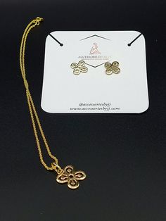 The Adinkra Bese Saka Necklace & Earring Set is a 16 inch gold plated necklace with the charm and matching earrings. The charm and the earrings have historical significance in the West African culture. Bese Saka is one of the Adinkra Symbols of West Africa. Adinkra Symbols are visual symbols with philosophical sign Gold Jewelry Sets With Matching Earrings Pendant, Gold Jewelry Sets With Matching Pendant Earrings, Gold Jewelry Sets With Matching Earrings As Gift, Gold Necklaces With Matching Earrings For Gift, Adjustable Gold Jewelry Sets With Matching Earrings, Gold Brass Necklaces With Matching Earrings, Gold Brass Necklace With Matching Earrings, Brass Jewelry Sets With Matching Earrings As Gift, West African Culture