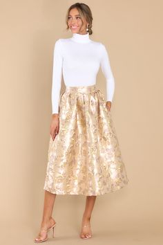 You will be Forever Grateful for this gold floral skirt! Anytime you want to dazzle your admirer(s) with all of your inner beauty, just slip this fit and flare skirt on to bring it out! Skirt features a high waist, raised gold flower details, waist pockets, a hemmed bottom, and a back zipper closure. Model is wearing an x-small. • 100% Polyester • Hand Wash Cold • Unlined • Imported Gold Midi Skirt, Skirt Classy, Jacquard Midi Skirt, Gold Skirt, Turtleneck Bodysuit, Fit And Flare Skirt, Red Dress Boutique, Forever Grateful, Long Sleeve Turtleneck