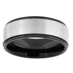 a black and white wedding band with a brushed finish on the inside, in stainless steel