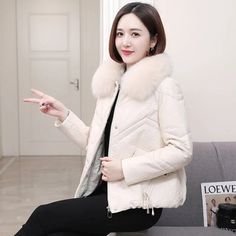 Women’s Genuine Leather Down Fox Fur Collar Real Leather Sheepskin Winter Coat  -  GeraldBlack.com Beige Outerwear With Faux Fur Lining, Winter White Outerwear With Zipper For Cold Weather, Chic Winter Outerwear With Zipper Closure, Winter Long Sleeve Fur Coat With Zipper, Beige Winter Outerwear With Zipper Closure, Chic Winter Fur Coat With Zipper Closure, Fitted Winter Fur Coat With Padded Collar, Winter Faux Fur Outerwear With Padded Collar, Winter Leather Fur Coat With Padded Collar