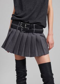 Color: Dark Grey Melange Heavyweight wool blend fabric Slim fit Mini length Pleated detailing throughout Double belt loops Lined 56% Polyester 24% Rayon 18% Wool 2% Polyurethane Dry Clean By The Frankie Shop. Imported *Belts are not included with skirt; used for styling purposes only Fall Mini Skort With Belt Loops, Mini Pleated Skirt, Pleated Skirt Short, Double Belt, Knife Pleats, The Frankie Shop, Frankie Shop, Miniskirt Outfits, Pleated Shorts