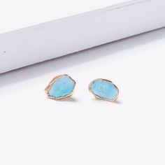 New design made with a 14k gold filled earring posts and backs! This statement earring set is made from genuine kingsman turquoise, a natural gemstone. The gemstone's size and texture may vary slightly, some gems have more marbling than others. ✨14k Gold Filled Earring Post and BacksGenuine American TurquoiseLarge, ranging from about 8mm to 15mm wide ✨✨ Please send me a message if you have any concerns about the quality of your jewelry. I have a very generous return policy and my top priority is Turquoise Earrings Gold, December Birthstone Jewelry, Raw Turquoise, Raw Gemstone Jewelry, Turquoise Stud Earrings, Birthstone Earrings, Tiny Studs, Earring Post, American Turquoise