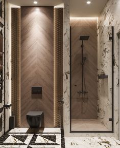 an elegant bathroom with marble walls and flooring, along with a walk - in shower