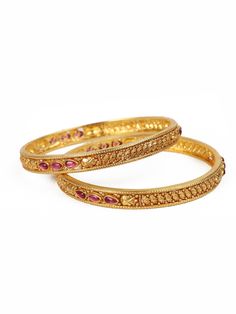 These 925 silver bangles, meticulously adorned with a lustrous gold polish, epitomize refined elegance. These red ruby kemp-studded bangles make for an exquisite complement to opulent Indian ensembles like a lavish salwar kurta or a resplendent saree. This item is sold in Pairs. Available size: 2.4 size. Condition: New. This product is intricately designed and meticulously handcrafted with exceptional care by our skilled silversmiths, employing traditional Indian techniques. Every jewelry piece Cheap Metal Bangle For Wedding, Cheap Wedding Bangle Jewelry, Cheap Metal Wedding Bangle, Cheap Women's Bangle For Wedding, Indian Bangles Gold Design, Wedding Jewelry Indian, Silver Kada, Fashion Jewelry Necklaces Gold, 22k Gold Bangles