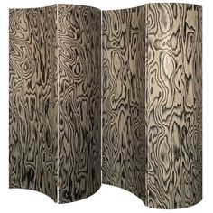 four panel screen with woodgrain pattern on the sides and one section closed up