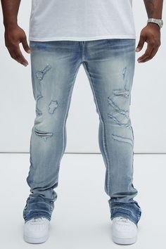 Available In Medium Wash. Stacked Skinny Flare Fit Stretch Denim 70% Cotton 28% Polyester 2% Spandex Disclaimer: Due To The Distressing Process, & Wash Process, Each Garment Is Unique. Zip Fly Button Closure 5 Pocket Detail Ankle Zipper Drop Imported | Mens Stand Out Stacked Skinny Flare Jeans in Medium Wash size 36 by Fashion Nova Urban Style Distressed Stretch Bottoms, Urban Ripped Fitted Jeans, Urban Style Ripped Fitted Jeans, Urban Stretch Ripped Bottoms, Urban Style Stretch Ripped Bottoms, Stretch Denim Jeans For Streetwear, Medium Wash Stretch Jeans For Streetwear, Ripped Stretch Jeans For Streetwear, Stretch Medium Wash Jeans For Streetwear