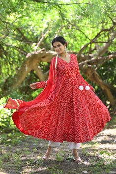 PRODUCT DESCRIPTION :-Time to Flaunt you 'Desi side' with this beautiful red Bhandej anarkali.Anarkali :- Reyon cottonPant :- CottonDupatta :- ChiffonColor:-Anarkali and dupatta - Red Pant - Off whiteCare Instructions :- Dry clean onlyModel Size :- Model is wearing XS sizeModel Height :- 5.6''DISCLAIMER :- Slight color variations may occur due to different screen resolution. Red Anarkali Set For Navratri, Red Anarkali Set With Dabka Embroidery, Red Anarkali Set With Dabka Detailing, Red Anarkali Set With Dabka For Navratri, Navratri Red Anarkali Set With Dabka Details, Red Dabka Anarkali Set For Navratri, Red Mulmul Salwar Kameez Traditional Drape, Red Anarkali Set With Dabka, Traditional Red Mulmul Salwar Kameez