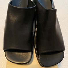 Great Pair Of Cole Haan Sandals, Black, Size 6.5m Leather And Never Worn, They Are 2 1/2” In Height! Sorry No Box! Smoke And Pet Free Home! Black Slide Mules With Removable Insole, Formal Black Open Heel Slides, Formal Slide Sandals With Leather Footbed, Black Slide Sandals For Formal Wear, Black Slide Sandals For Formal Occasions, Black Open Toe Slides With Leather Footbed, Medium Width Leather Slides With Open Toe, Leather Slip-on Slides, Black Slide Mules With Leather Footbed