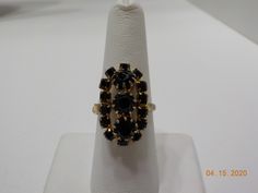 "Vintage faux black onyx ring. Setting is 1/2\" x 1\" loaded with faceted, & prong set faux black onyx. All are present and intact. Adjustable band is currently set at size 8...some discoloring at the bottom of the band. See last picture. Excellent vintage condition." Black Faceted Jewelry For Anniversary, Faceted Black Jewelry For Anniversary, Black Faceted Rings For Formal Occasions, Black Adjustable Rings For Formal Occasions, Rhinestone Ring, Black Onyx Ring, Ring Setting, Onyx Ring, Glass Bead Necklace