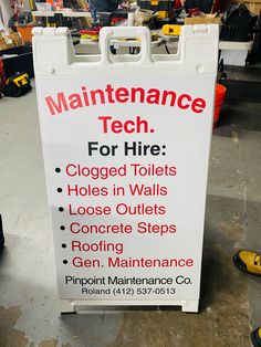 a sign that says maintenance tech for hire in front of other tools and equipment on the floor