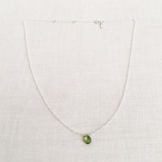 "This is a peridot necklace made of genuine high quality faceted peridot. There are gold filled ,sterling silver and 14kt gold chain you can choose from. Each necklace has 2\" extender. There are 2 sizes that you can choose from 14\"-16\" and 16\"- 18\" in gold filled or sterling silver. 14k gold necklace will be in single size without extender.This is a August birthstone necklace. Peridot jewelry is light weight and elegant. This green peridot is around 1 carats. The green stone necklace is gre Faceted Peridot Jewelry For May Birthstone, Peridot Faceted Jewelry For May Birthstone, Green Minimalist Gemstone Birthstone Necklace, Green Peridot Pendant Necklace, Peridot Gemstone Pendant Necklace, Teardrop Peridot Birthstone Jewelry, Green Peridot Necklace For May Birthstone, Peridot Briolette Gemstone Jewelry, Oval Green Peridot Necklaces