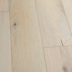 an image of wood flooring that looks like it has been cleaned and is white