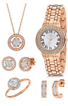 This captivating watch and jewelry set includes a rose gold plated watch (Japanese movement and splash resistant) bedecked with crystal accents along with 2 pairs of earrings, a matching necklace and a size adjustable ring to compliment the look. All presented in an elegant gift box. Capsule Wardrobe Jewelry, Spring Jewelry Trends, Watch And Jewelry, Gold Plated Watch, Watch Set, Spring Jewelry, Rose Gold Watches, Original Jewelry, Rose Gold Watch