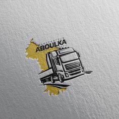 a truck logo is shown on the side of a white paper with yellow and black ink