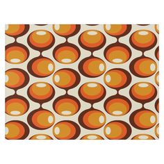 an orange and brown pattern with circles on it