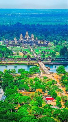 an aerial view of the ancient city of angboid, with its surrounding trees and water