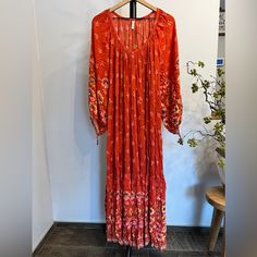 Nwot Gorgeous Spell & The Gypsy Joni Maxi Dress In The Color “Campfire” Which Is A Beautiful Orange/Red Color. Floral Design Throughout, Oversized And Flowy, 3/4 Sleeves With Bead Details. Size Says Large, But It Could Fit Xxl Comfortably. P2p 27” Waist 28” Length 53” Red Long Sleeve Bohemian Maxi Dress, Red Flowy Boho Dress For Fall, Bohemian Red Long Sleeve Dress, Bohemian Long Sleeve Red Dress, Red Maxi Dress For Fall Festival, Red Long Festival Dress, Red Long Boho Dress For Spring, Red Long Dress For Festival, Long Red Boho Dress For Spring