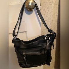 Coach Black Leather Pocketbook With Adjustable Strap, Zippered Pocket On Front, And Large Slip Pocket Inside. Brand New, Never Used. Bags Coach, Pocket Book, Coach Bags, Inside Pocket, Zipper Pocket, Shoulder Bags, Adjustable Straps, Black Leather, Bag Lady