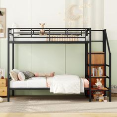 a black bunk bed sitting in a bedroom next to a dresser and bookshelf