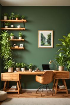 an office with green walls and plants on the desk, along with a laptop computer