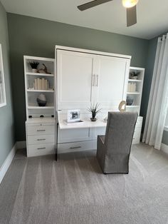 a white desk and chair in a room