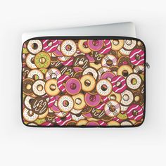 a laptop case with donuts all over it