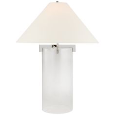 a glass table lamp with a white shade