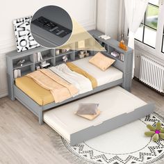 an image of a bedroom setting with bed and bookcases on the bottom shelf